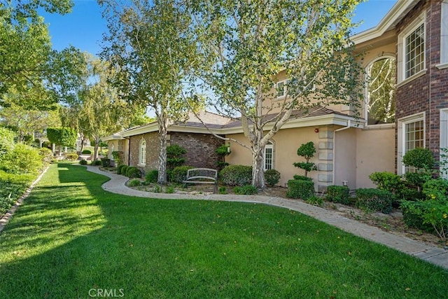 view of front of house with a front lawn