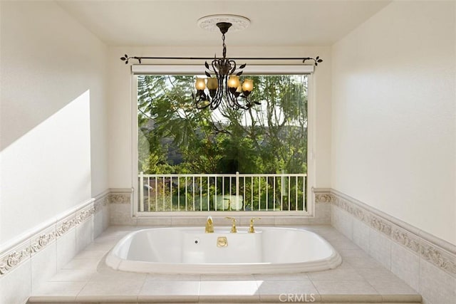 bathroom with an inviting chandelier