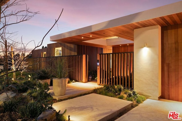 view of patio terrace at dusk