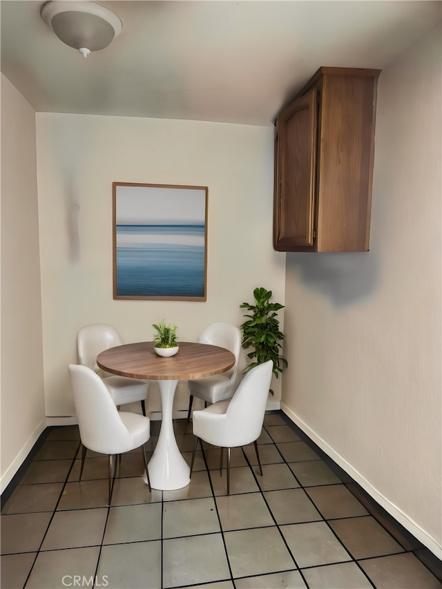 dining area with tile patterned floors