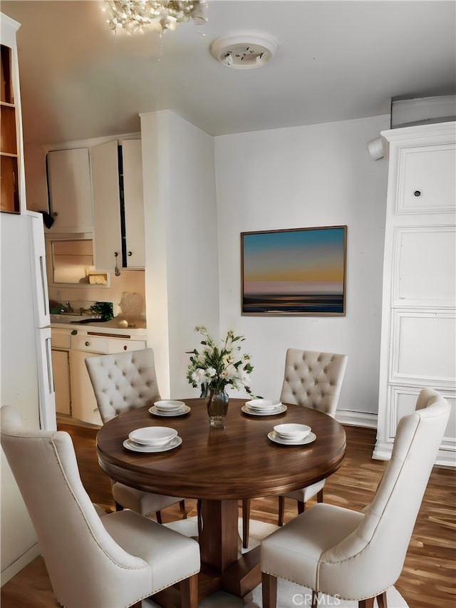 dining area featuring dark hardwood / wood-style flooring