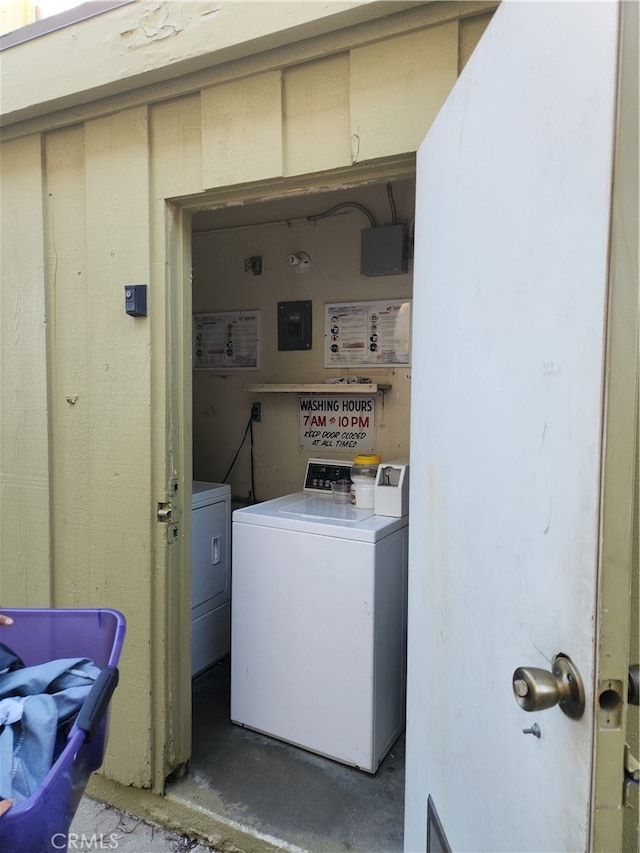 laundry room with independent washer and dryer