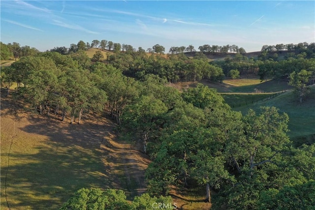 birds eye view of property featuring a rural view