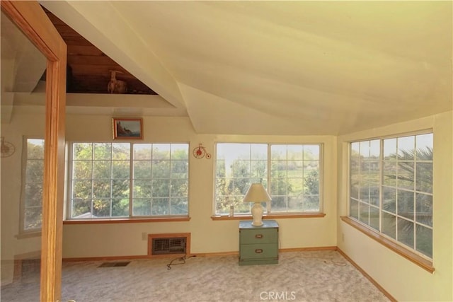 unfurnished sunroom featuring a wealth of natural light