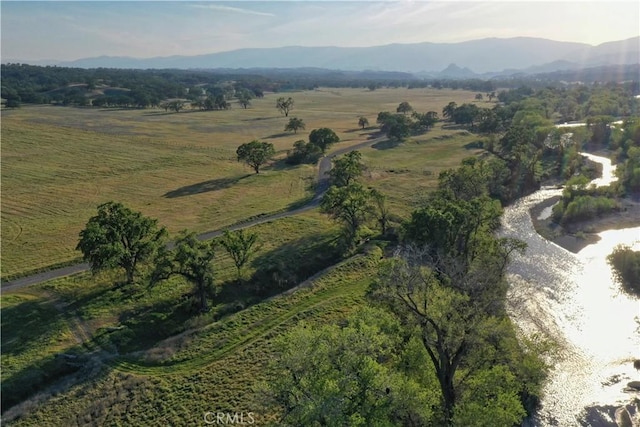 aerial view featuring a rural view and a mountain view