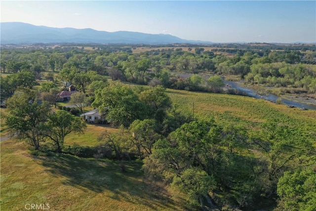 birds eye view of property with a mountain view