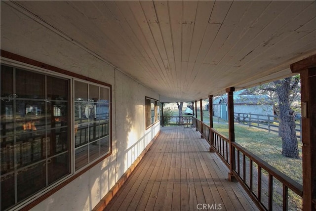 wooden terrace featuring a porch