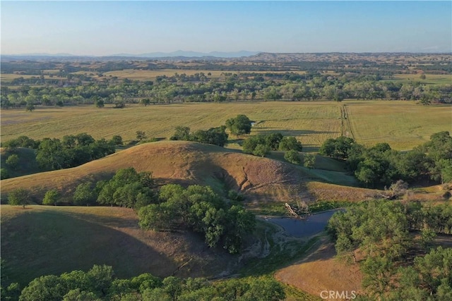 birds eye view of property featuring a rural view