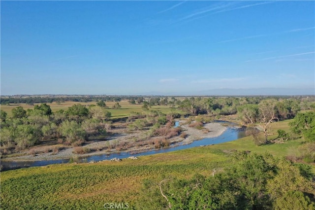 aerial view with a water view and a rural view