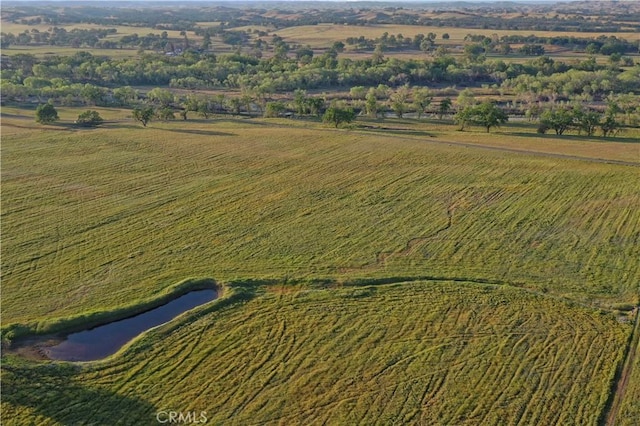 aerial view featuring a water view and a rural view