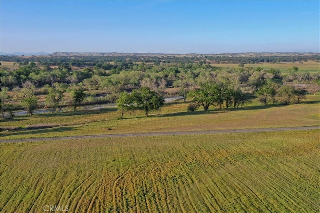 birds eye view of property featuring a rural view