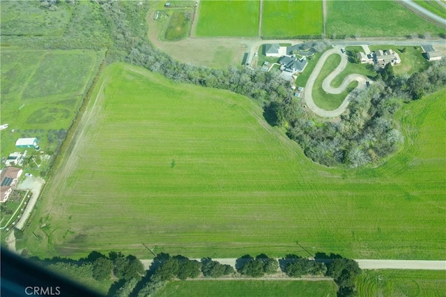 birds eye view of property featuring a rural view