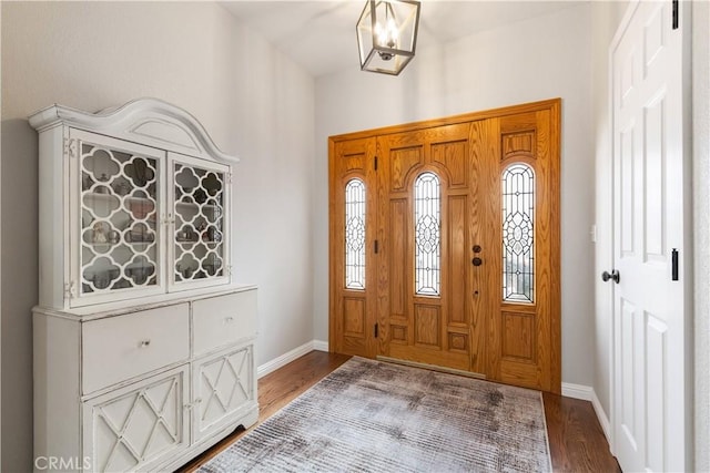 entryway with hardwood / wood-style floors