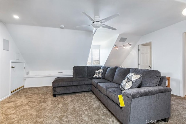 carpeted living room featuring vaulted ceiling and ceiling fan