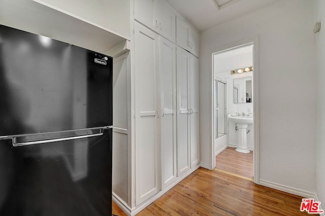 spacious closet with light wood-type flooring