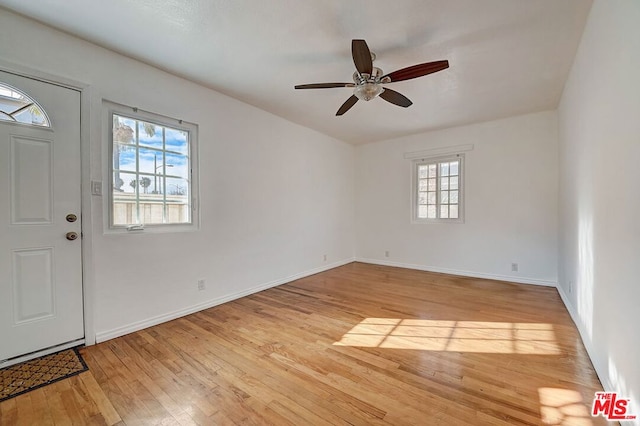 entryway with light wood-type flooring and ceiling fan