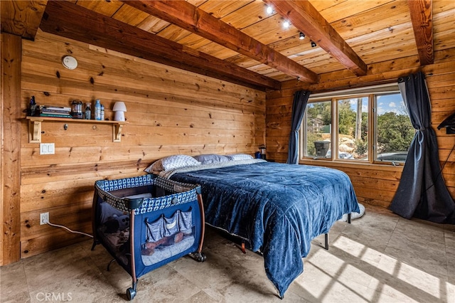 bedroom featuring beamed ceiling, wood walls, and wooden ceiling