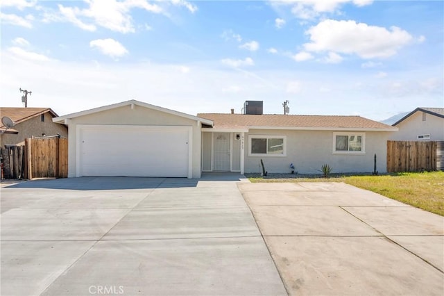 ranch-style house featuring a garage