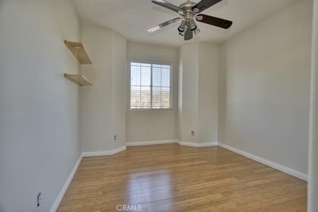 unfurnished room with ceiling fan and light hardwood / wood-style floors