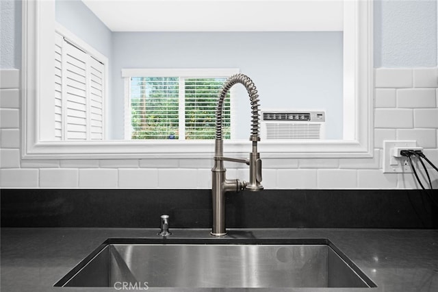 interior details with backsplash and sink