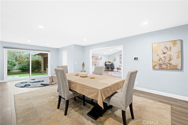 dining room featuring light wood-type flooring