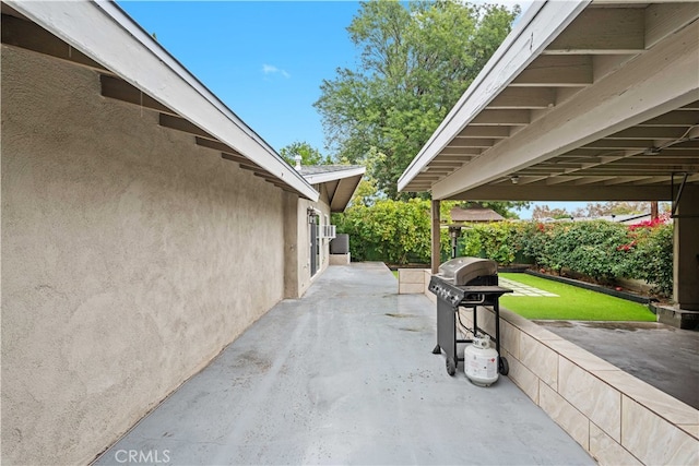 view of patio with area for grilling