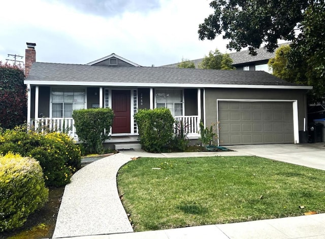 ranch-style home featuring a front yard, a garage, and a porch