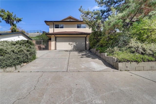 view of front of property with a garage