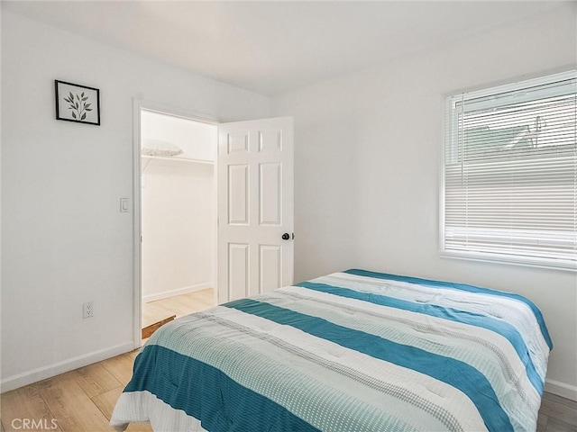 bedroom with light hardwood / wood-style flooring