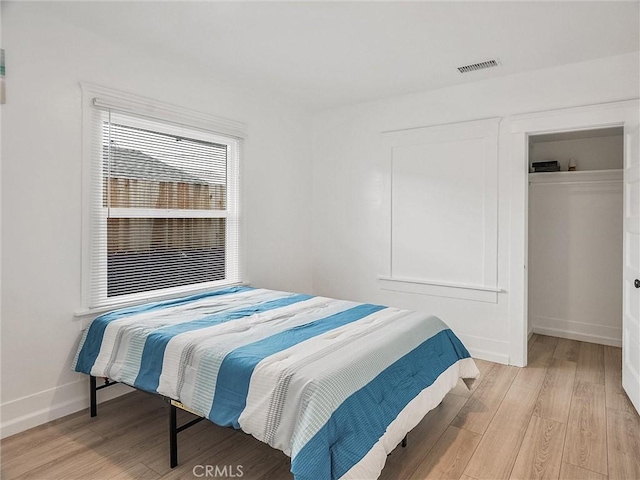 bedroom featuring light hardwood / wood-style floors