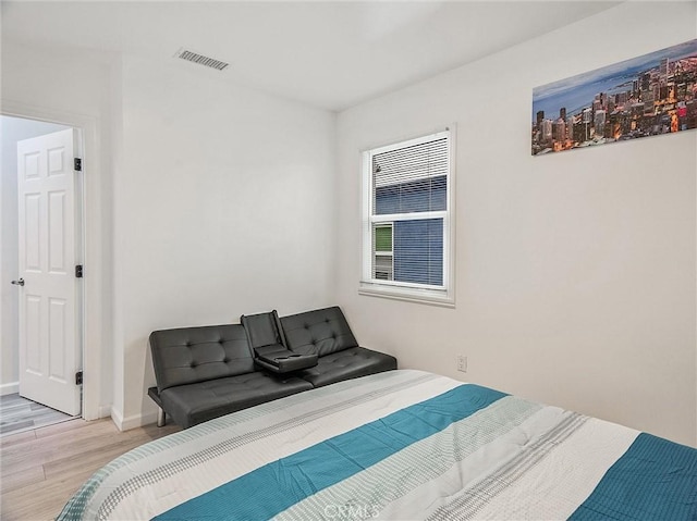 bedroom featuring light wood-type flooring