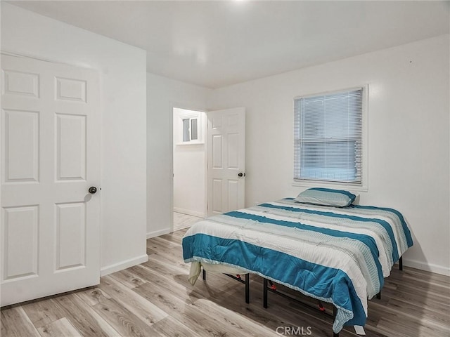 bedroom featuring light hardwood / wood-style floors