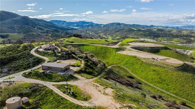 drone / aerial view featuring a mountain view