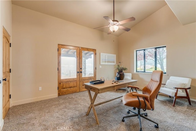 home office with french doors, light colored carpet, high vaulted ceiling, and ceiling fan