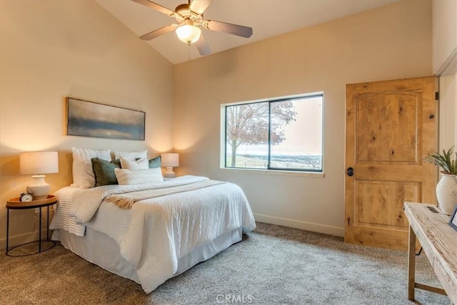bedroom featuring light carpet, high vaulted ceiling, and ceiling fan