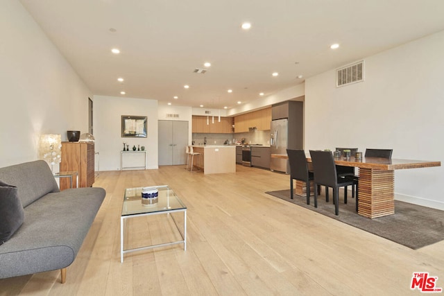 living room featuring light wood-type flooring