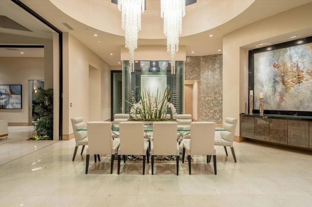 community lobby with a chandelier and light tile patterned floors