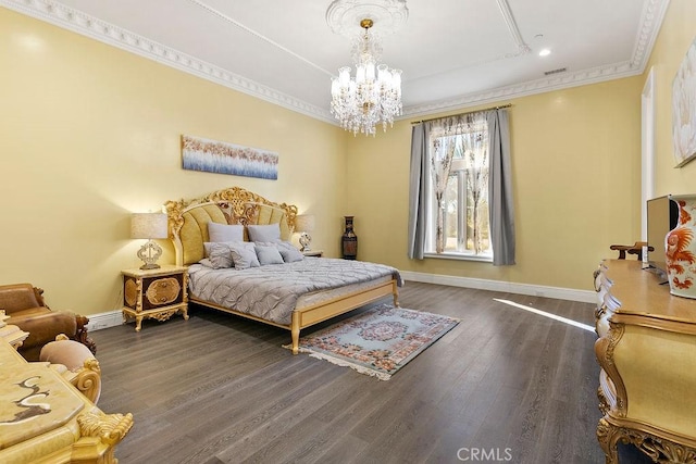 bedroom with crown molding, dark hardwood / wood-style floors, and an inviting chandelier