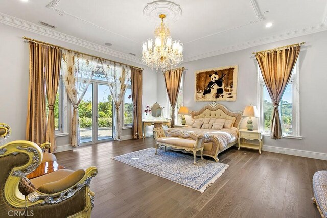 bedroom with multiple windows, a notable chandelier, access to exterior, and dark hardwood / wood-style flooring