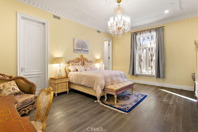 bedroom featuring an inviting chandelier, crown molding, and dark wood-type flooring