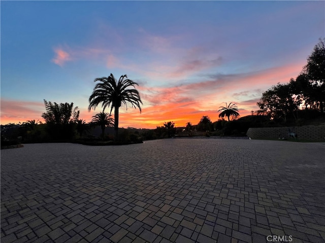 patio terrace at dusk with decorative driveway