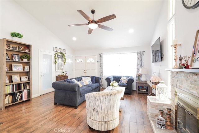 2425 N Fillmore Ave, Rialto, CA 92377 - living room with recessed lighting, high vaulted ceiling, a ceiling fan, and wood finished floors