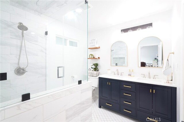 2425 N Fillmore Ave, Rialto, CA 92377 - full bath with a shower stall, double vanity, and a sink