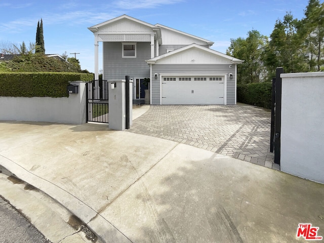 view of front of property with a garage