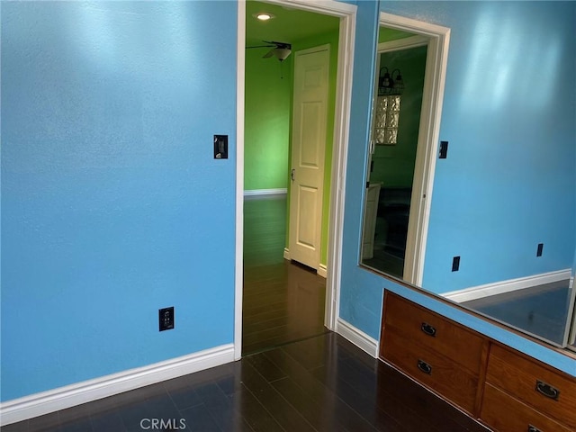 unfurnished room featuring dark hardwood / wood-style flooring