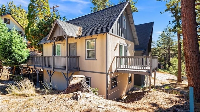 view of property exterior featuring a deck