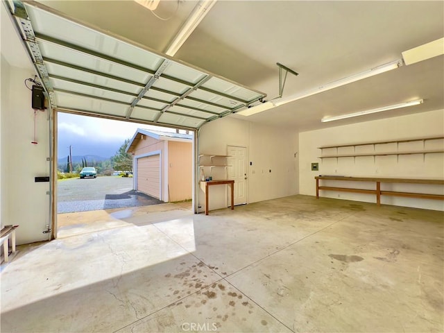 garage featuring a carport