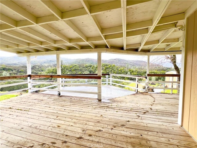 wooden terrace with a mountain view