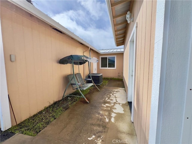 view of patio / terrace with central AC unit