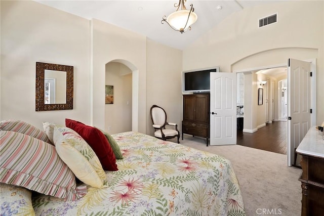 14600 El Monte Rd, Atascadero, CA 93422 - bedroom featuring arched walkways, carpet floors, and high vaulted ceiling